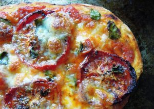 Slow roasted tomato and oregano pizza