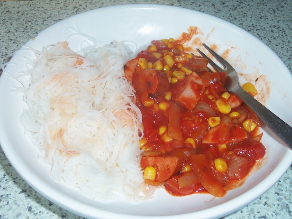 Pork, sweetcorn and tomatoes with vermicelli rice noodles